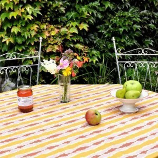 Nappe enduite FLEUR DE SOLEIL Ikat jaune curry - 7 tailles