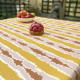 Nappe enduite FLEUR DE SOLEIL Ikat jaune curry - 7 tailles